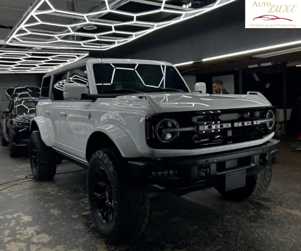 professionally installed automotive window tint on the side windows of a luxury vehicle